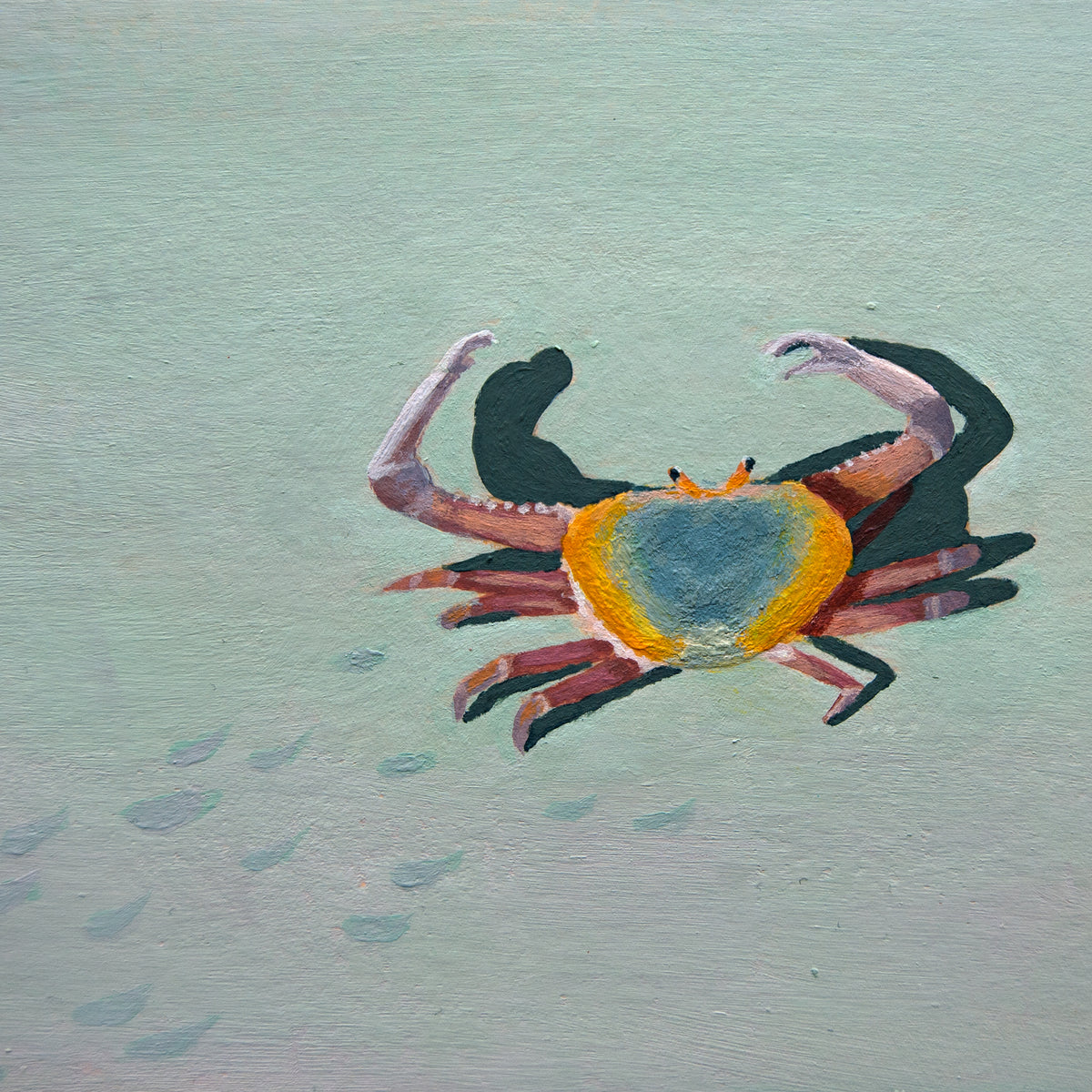 Painting of a crab on a textured sand background