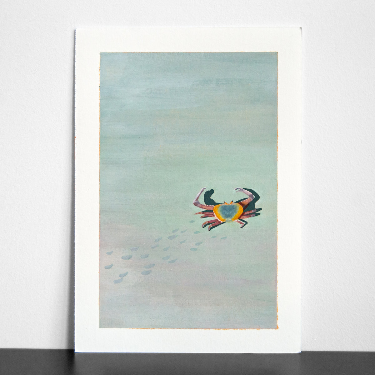 Painting of a crab leaving tracks on the sand