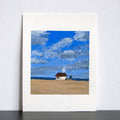Artwork of a lifeguard station against a blue sky with clouds.